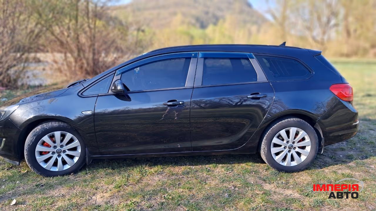 Opel Astra - фото 4