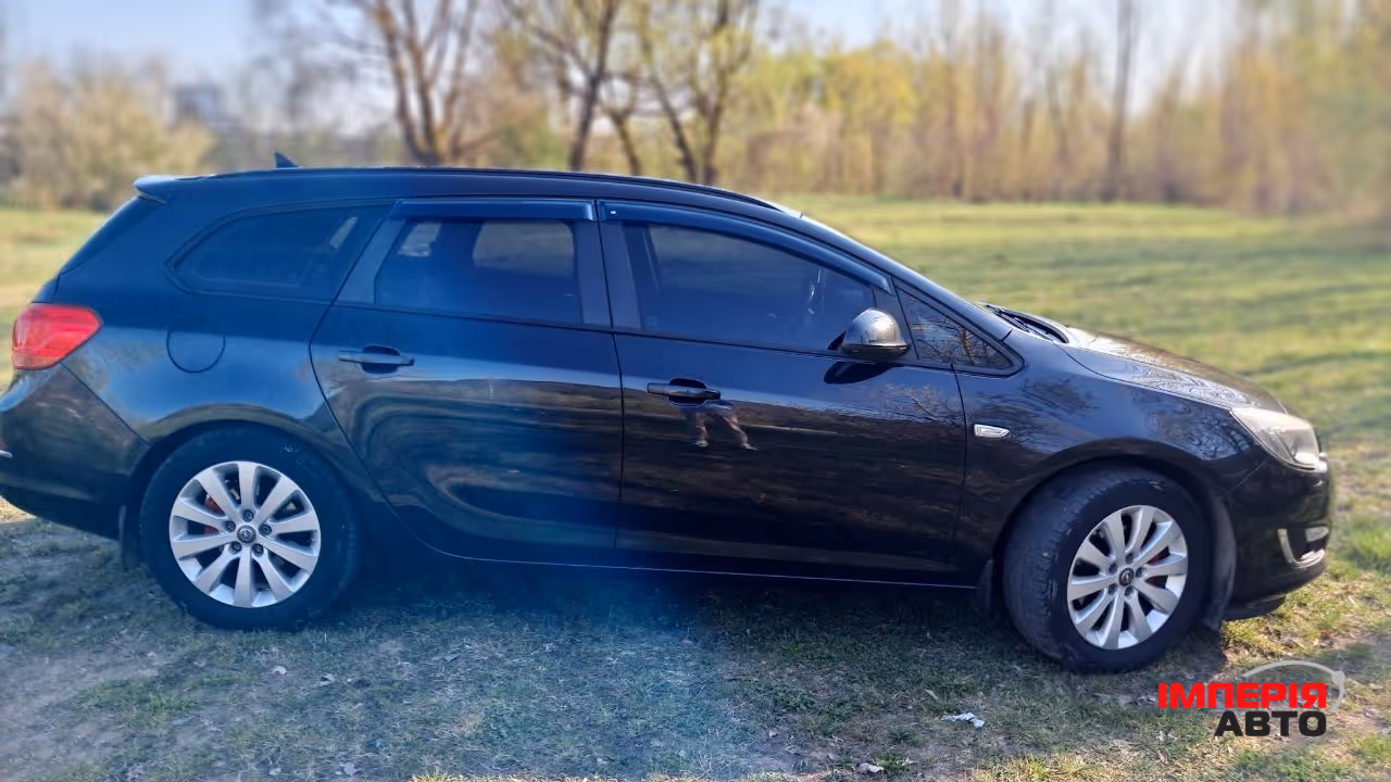 Opel Astra - фото 5