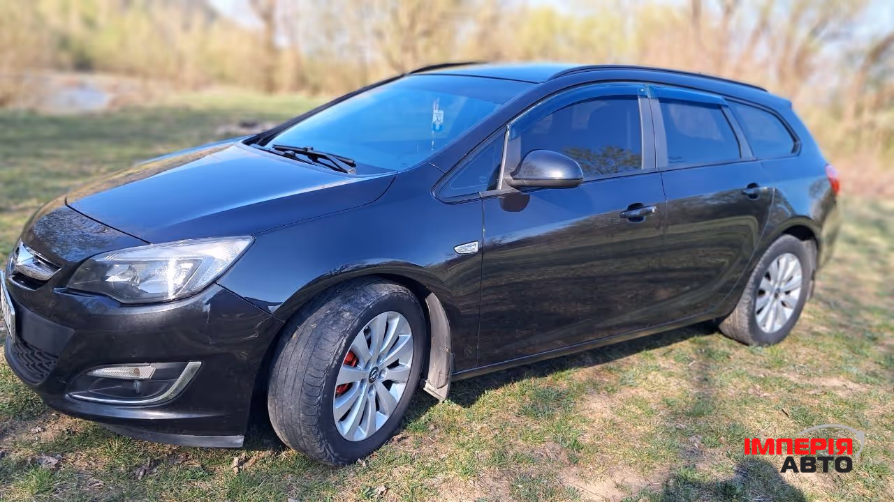 Opel Astra - фото 2