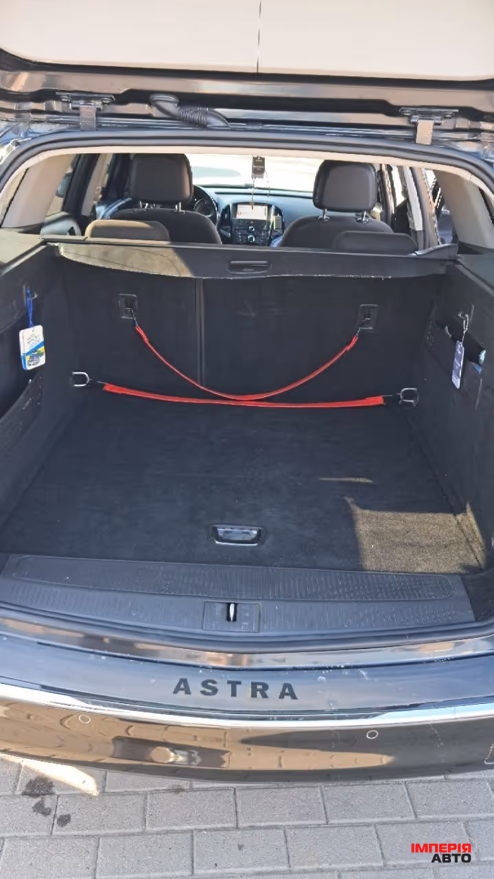 Opel Astra - фото 25