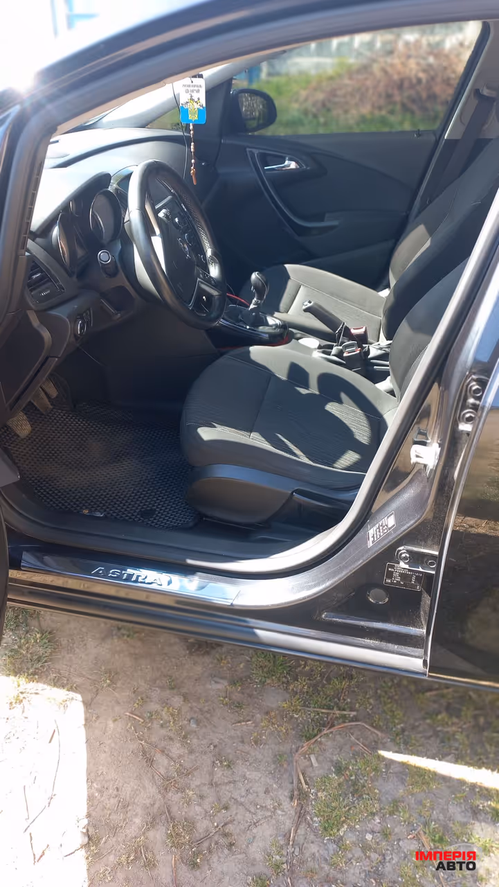 Opel Astra - фото 12