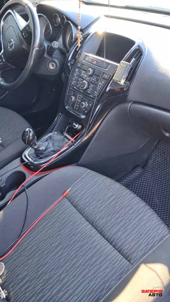 Opel Astra - фото 13