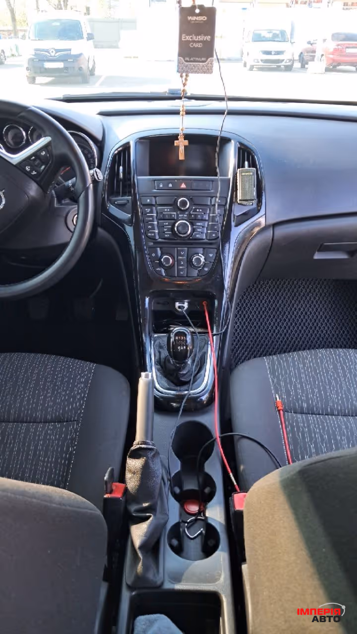 Opel Astra - фото 15