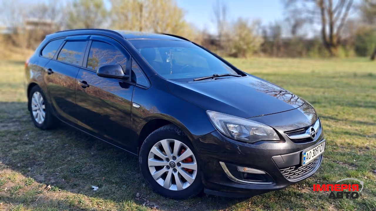 Opel Astra - фото 7