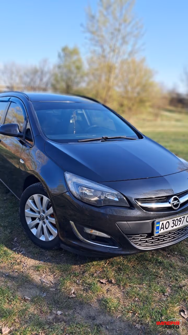 Opel Astra - фото 1