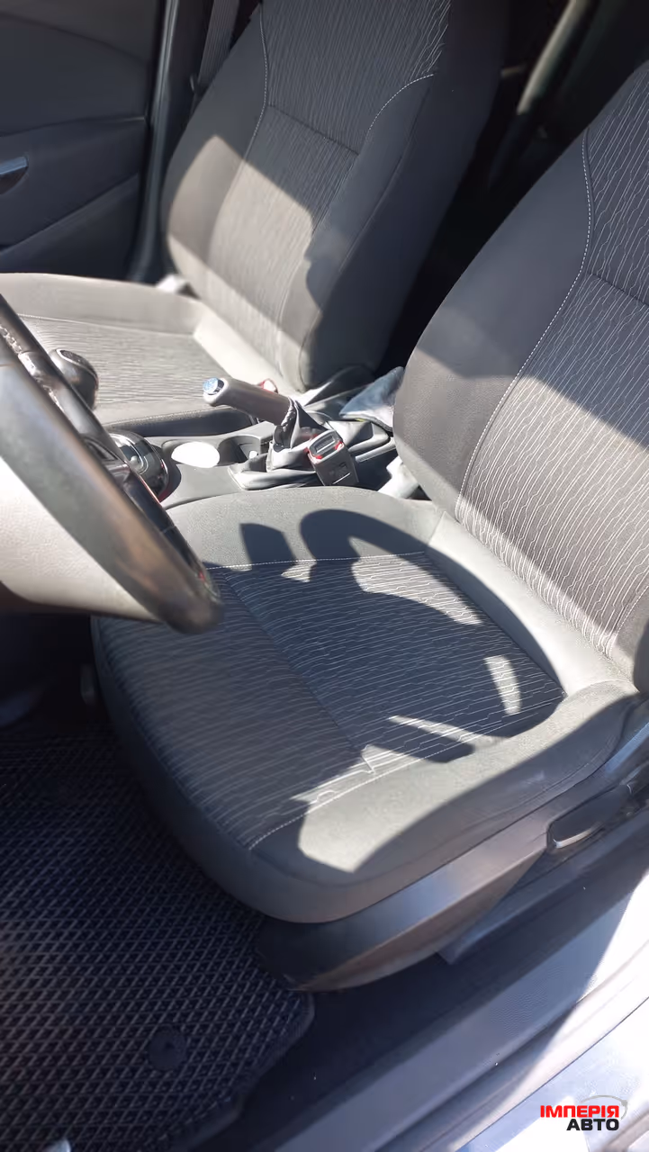 Opel Astra - фото 11