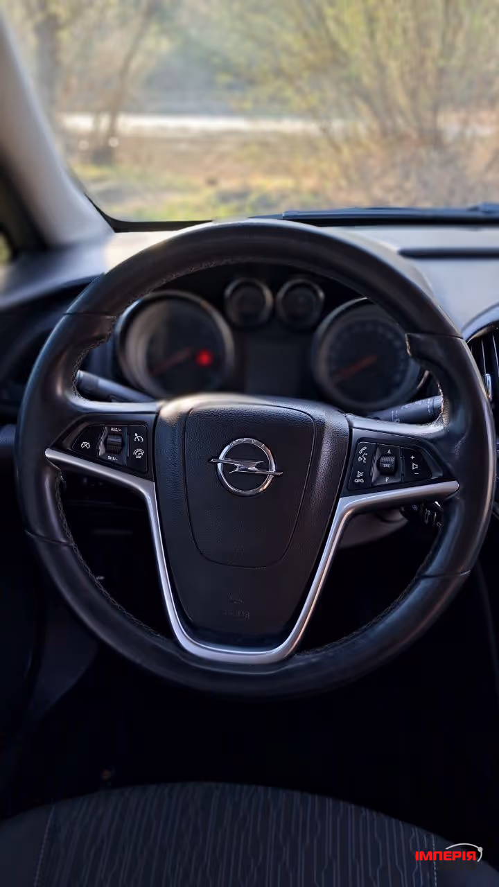 Opel Astra - фото 8