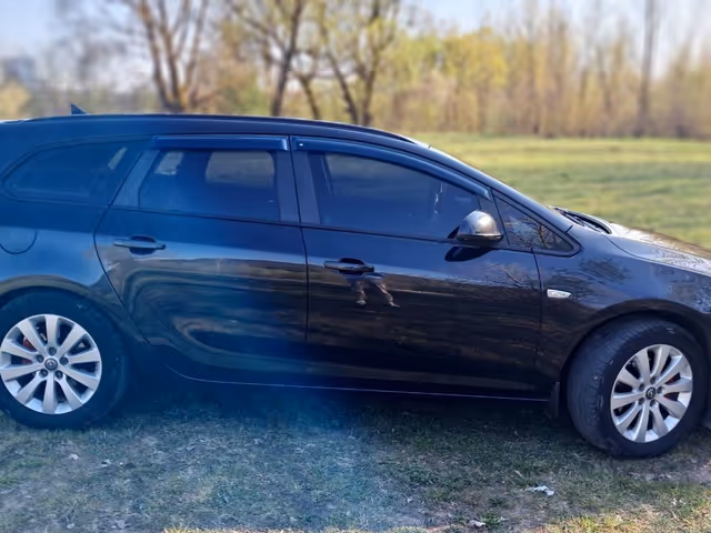 Opel Astra - фото 5