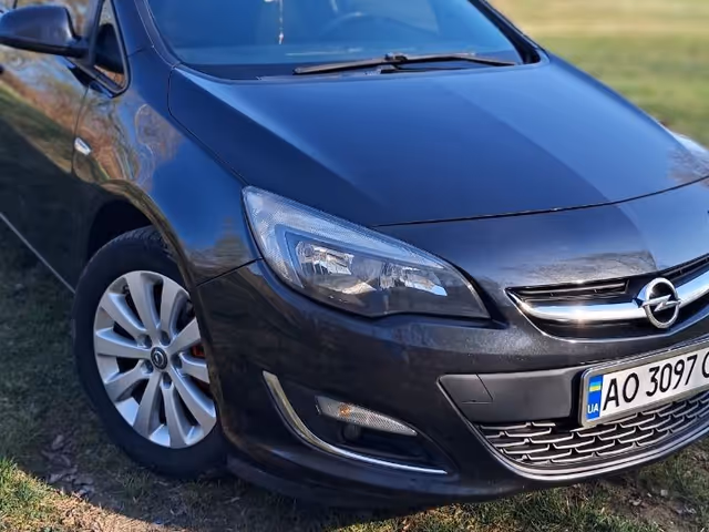 Opel Astra - фото 1
