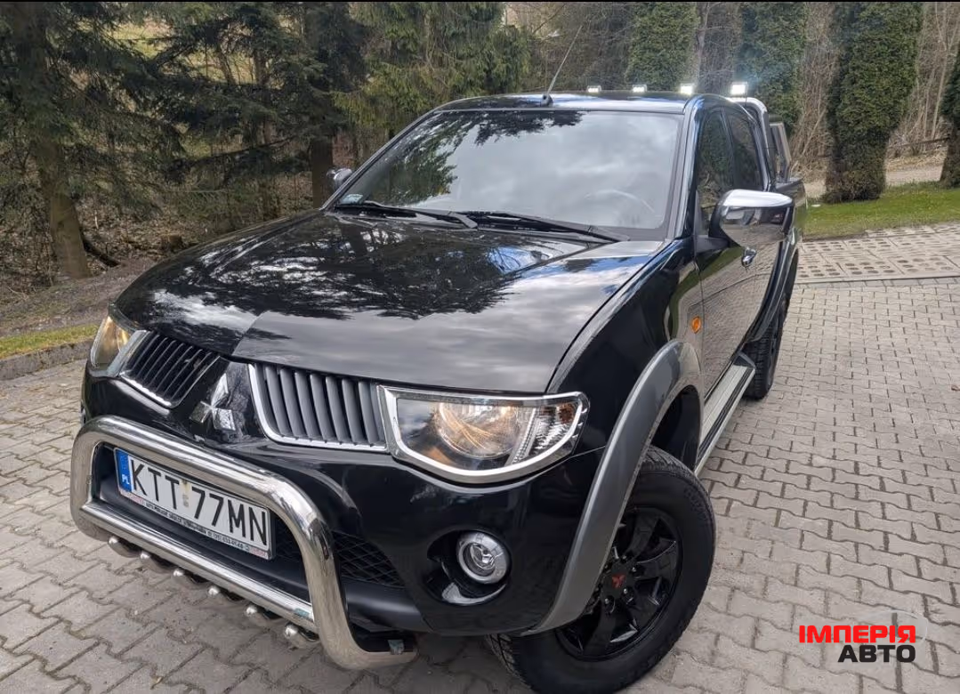 Mitsubishi L200 - фото 1