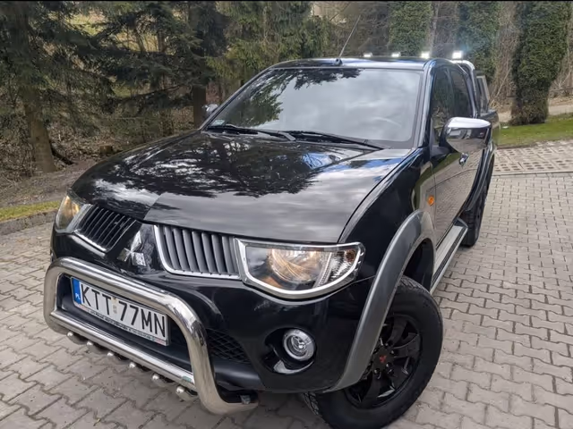 Mitsubishi L200 - фото 1