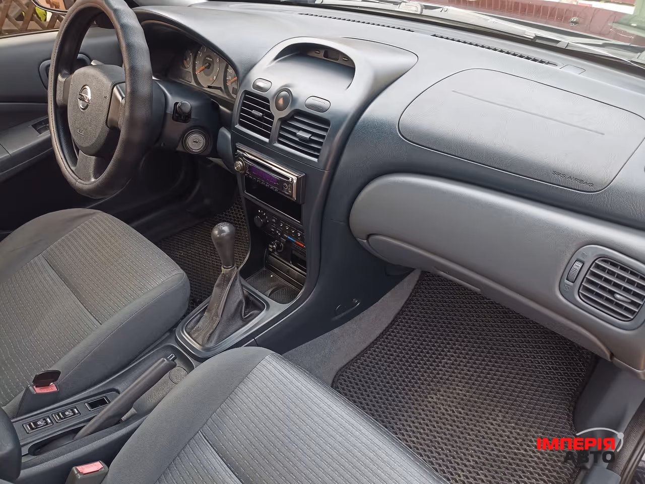 Nissan Almera Classic - фото 8
