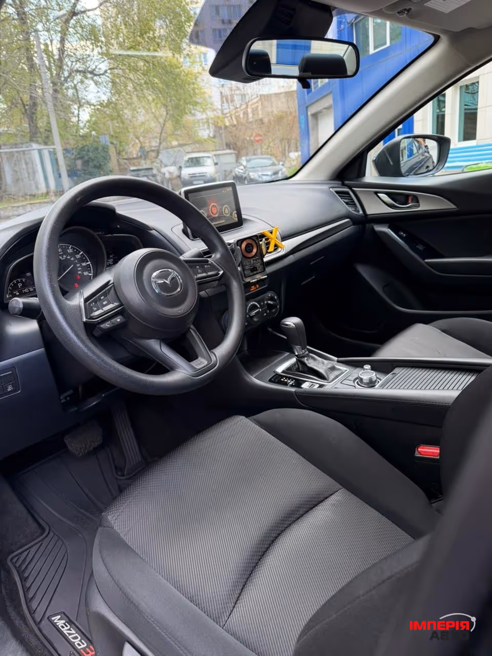 Mazda 3 - фото 10