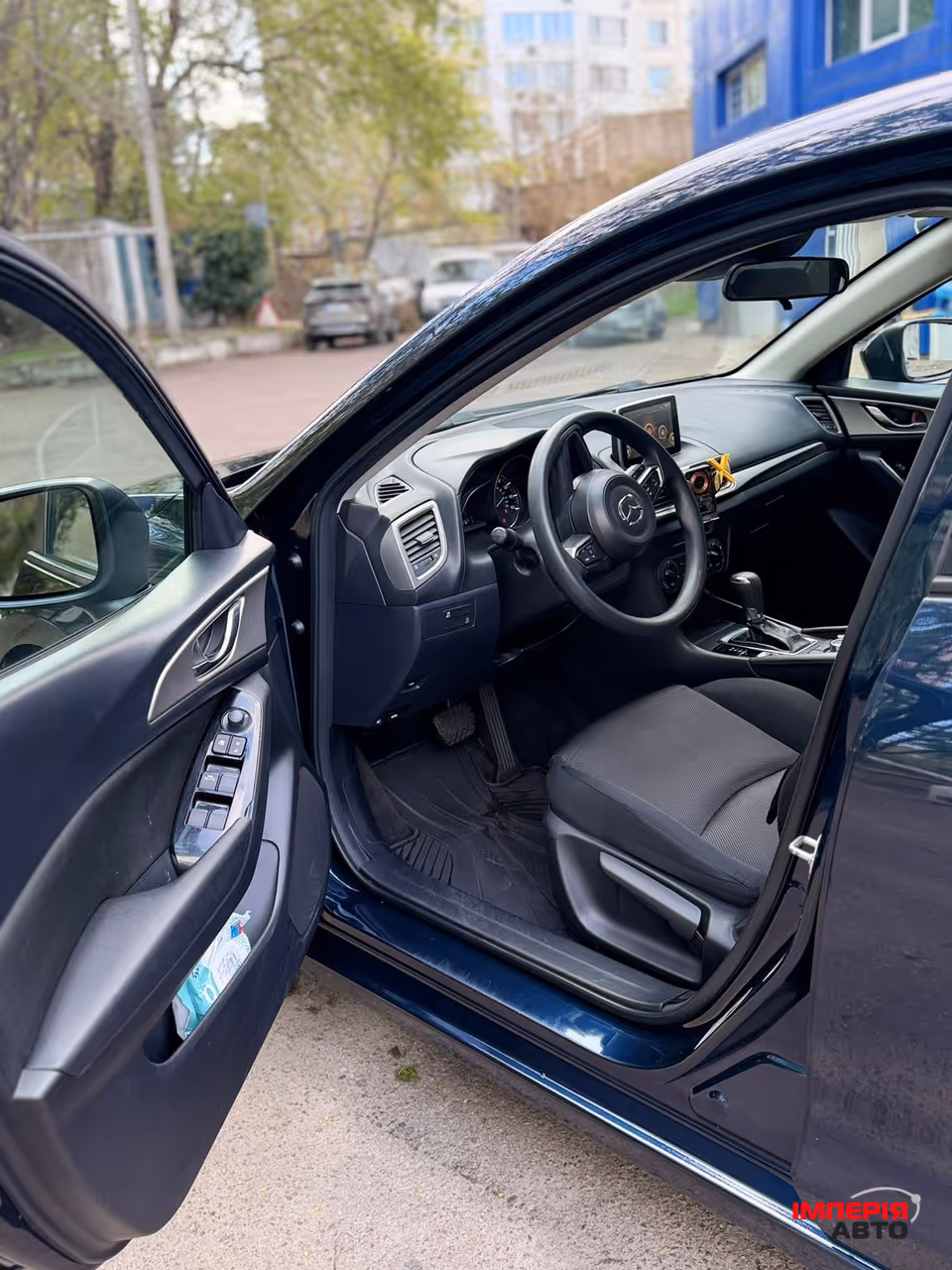 Mazda 3 - фото 8