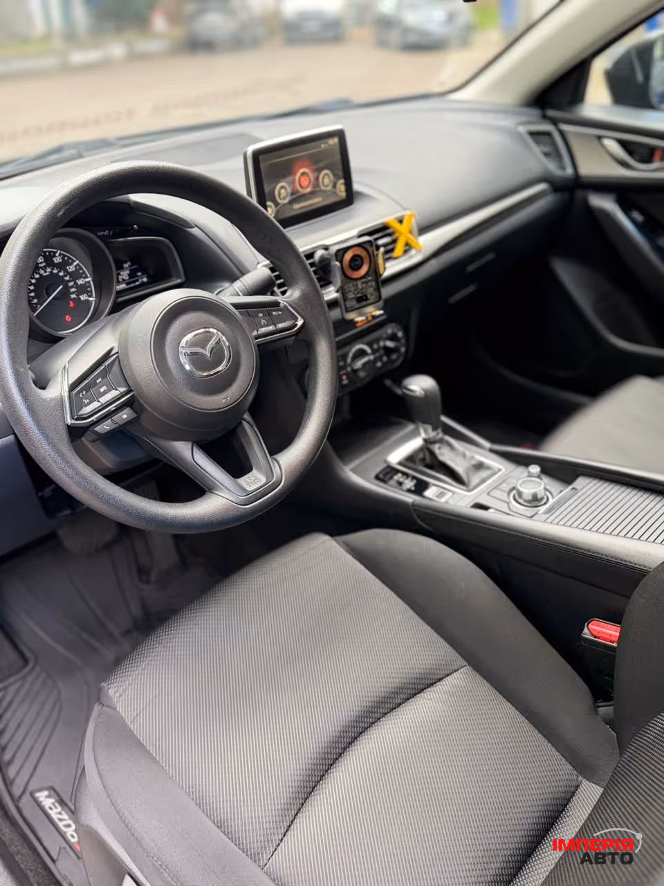 Mazda 3 - фото 11