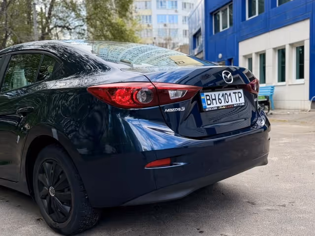 Mazda 3 - фото 4