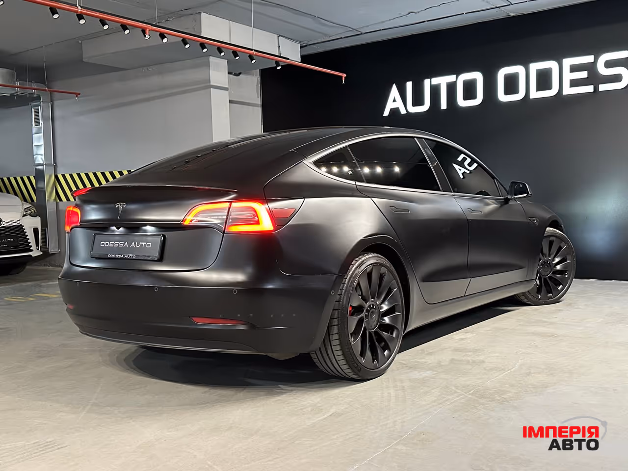 Tesla Model 3 - фото 7