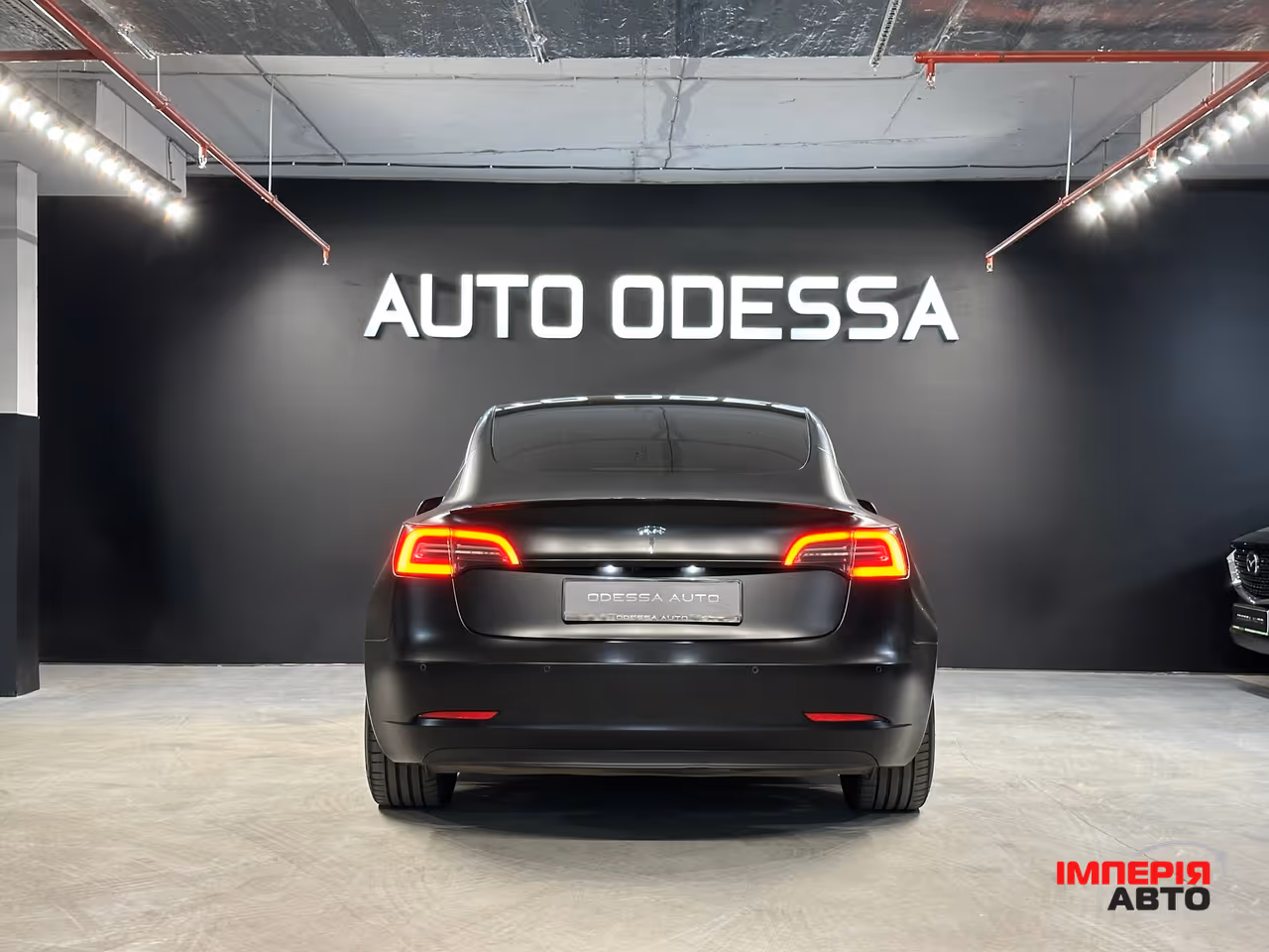 Tesla Model 3 - фото 8