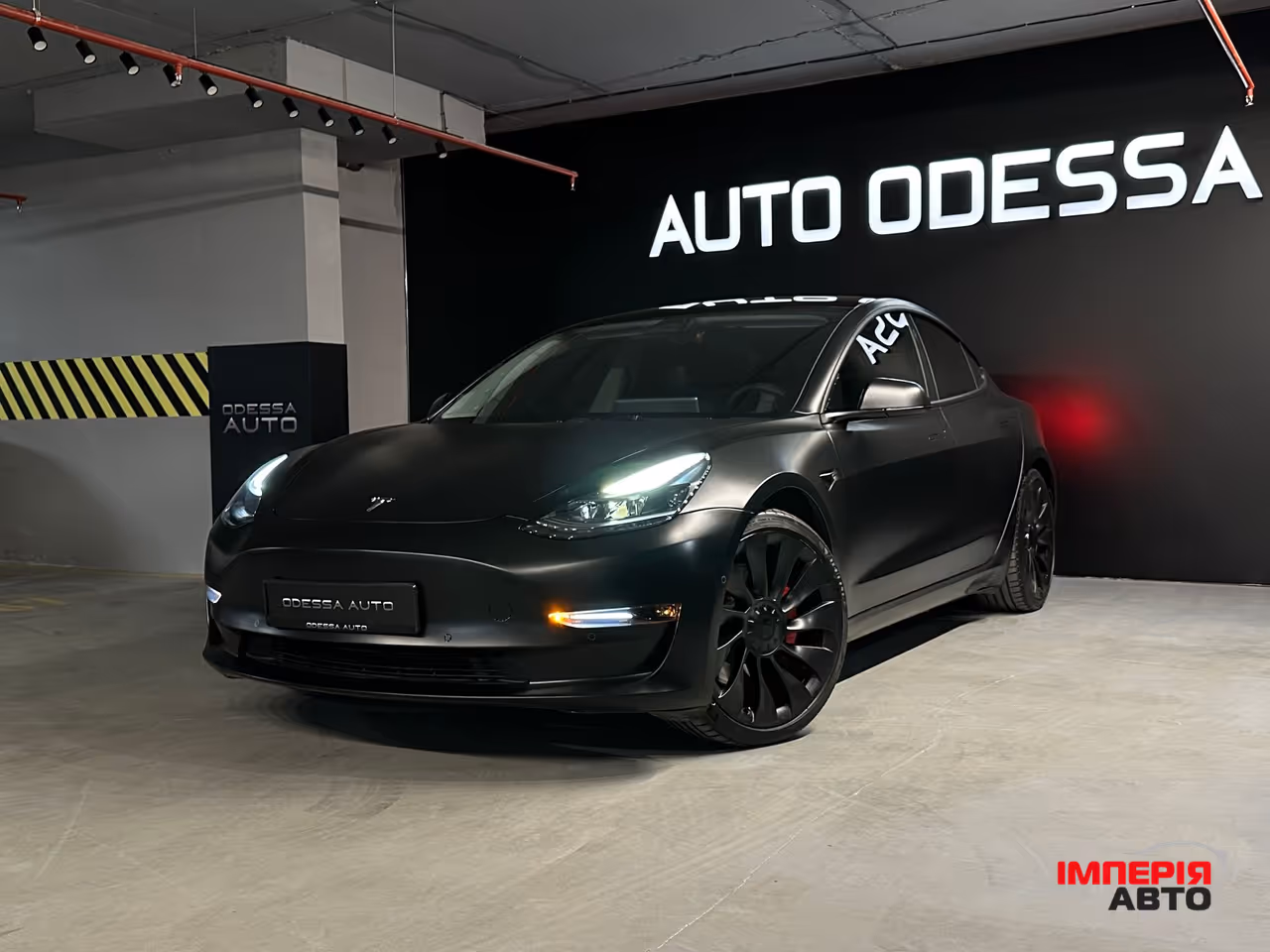 Tesla Model 3 - фото 1