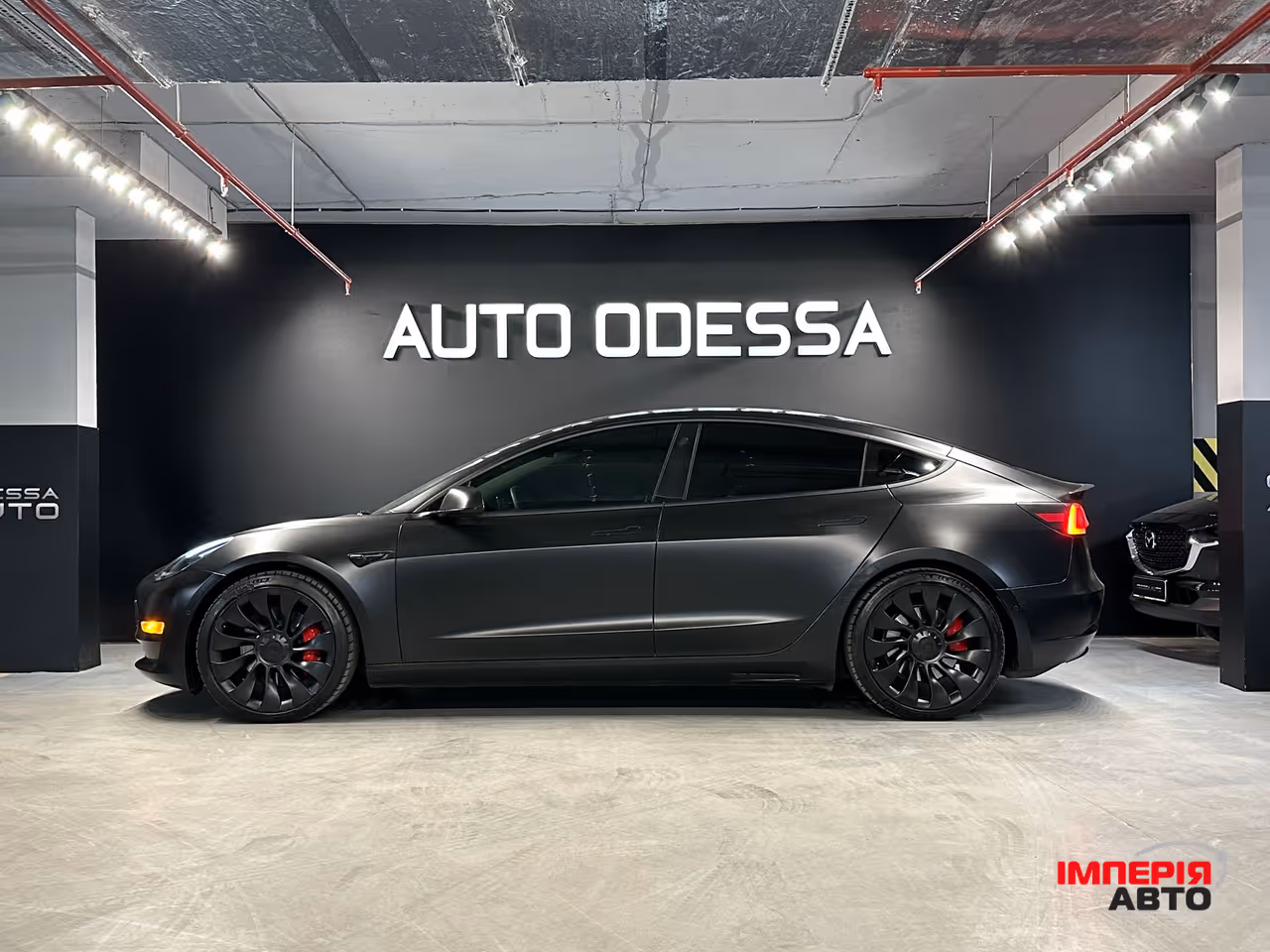 Tesla Model 3 - фото 4