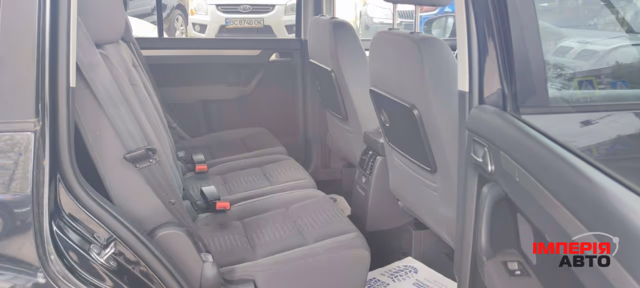 Volkswagen Touran - фото 5