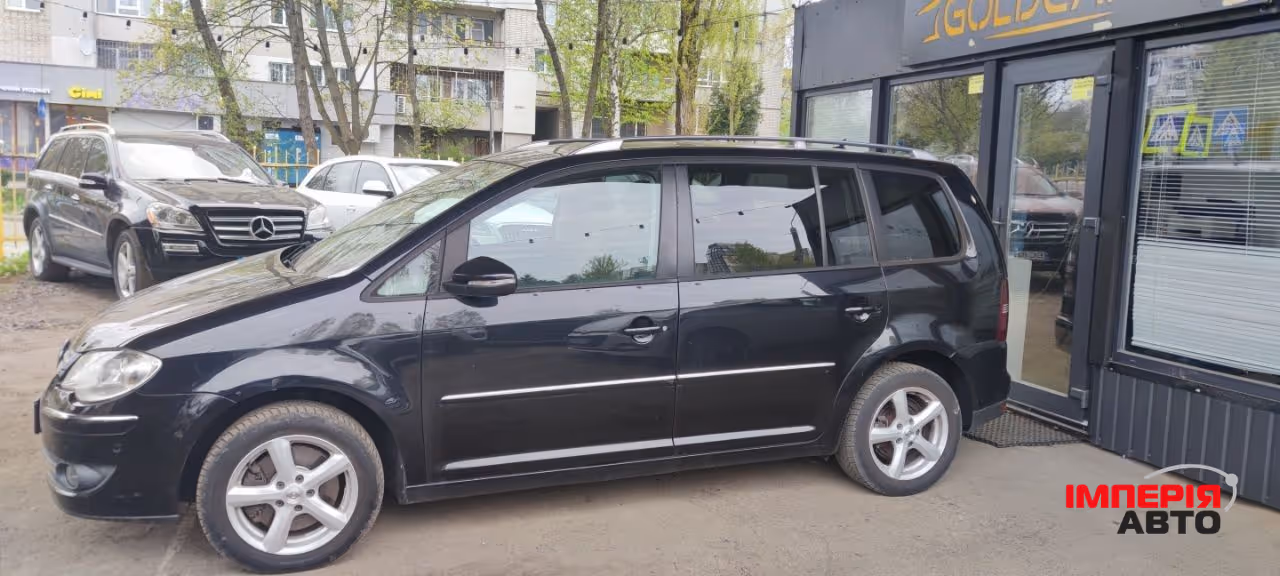 Volkswagen Touran - фото 6