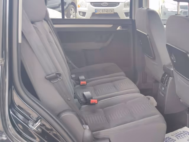 Volkswagen Touran - фото 5