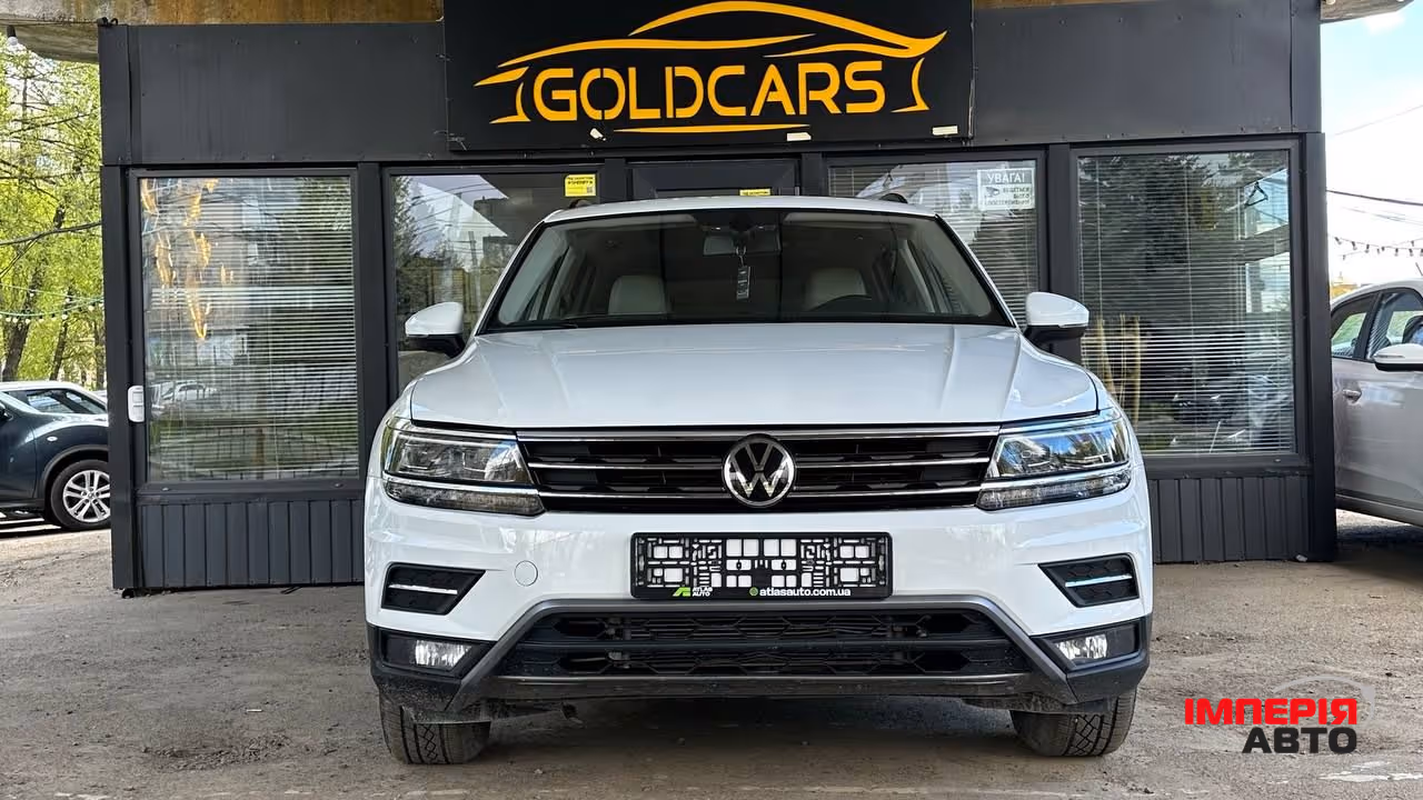 Volkswagen Tiguan - фото 1