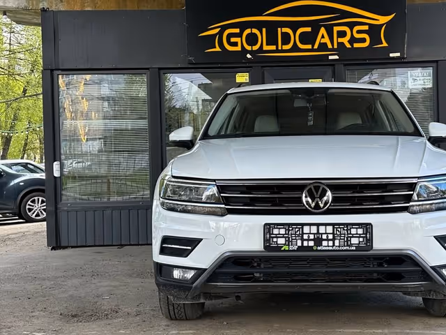 Volkswagen Tiguan - фото 1