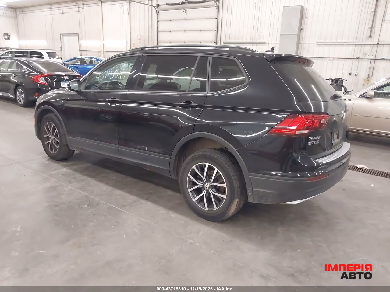 Volkswagen Tiguan - фото 4