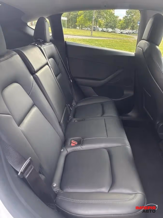 Tesla Model Y - фото 9