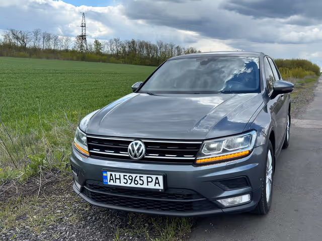 Volkswagen Tiguan - фото 1