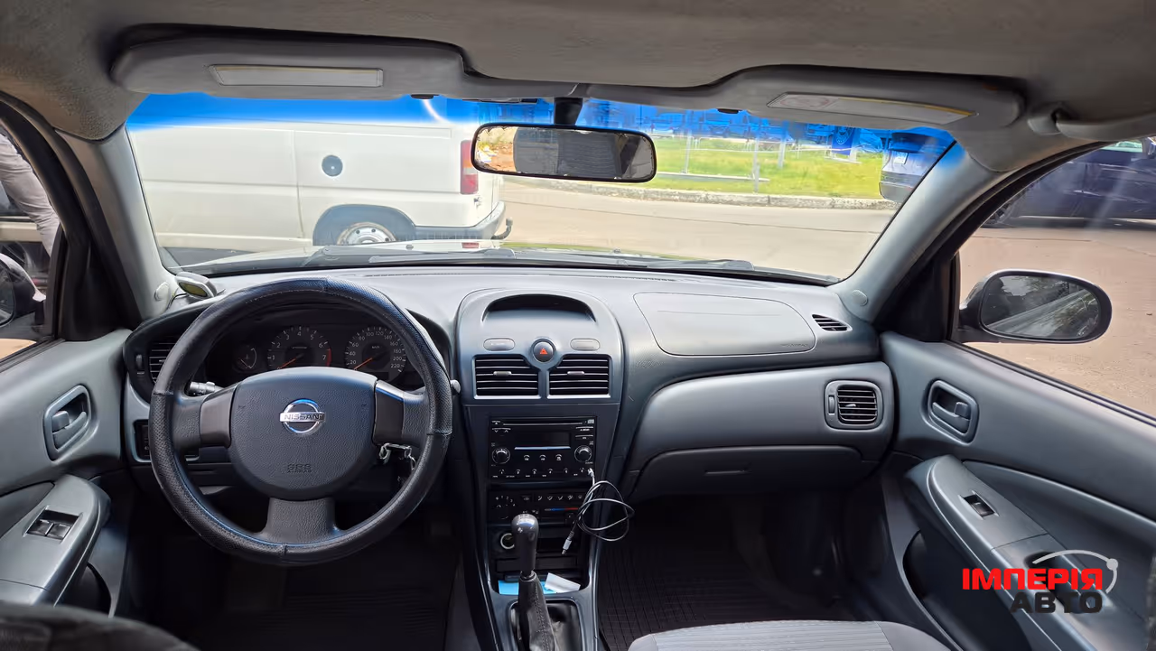 Nissan Almera Classic - фото 9