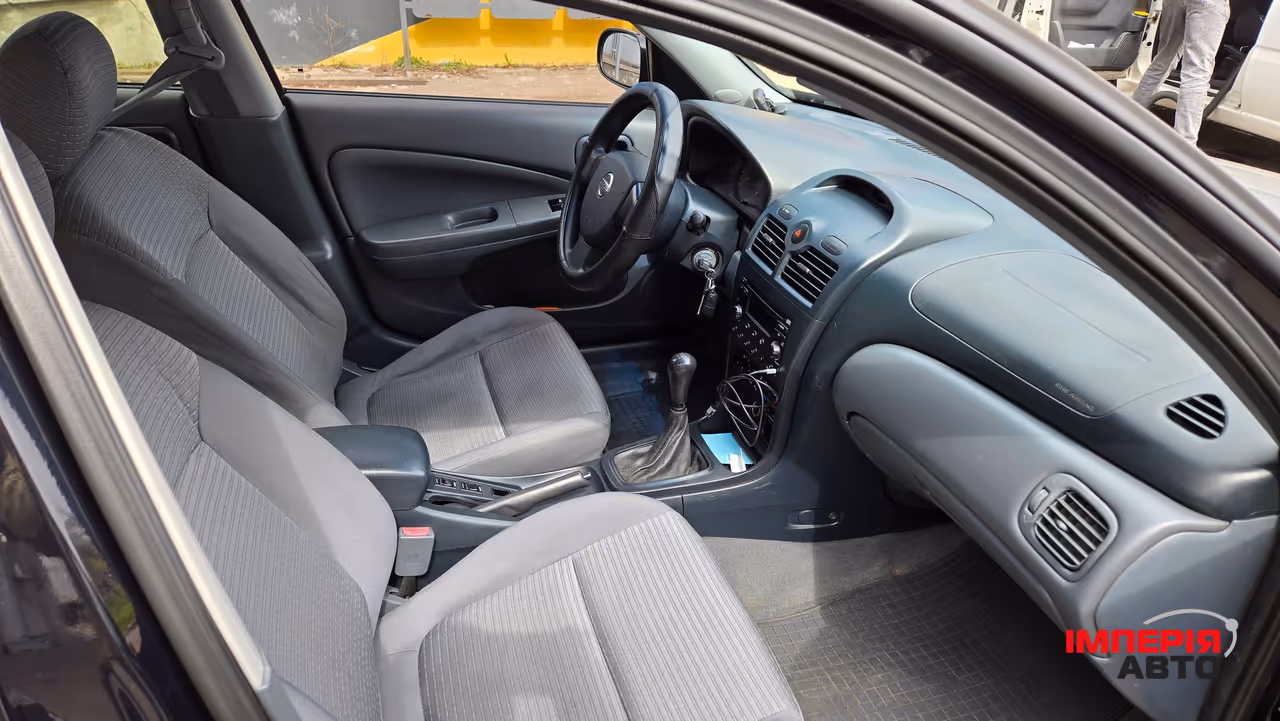 Nissan Almera Classic - фото 11