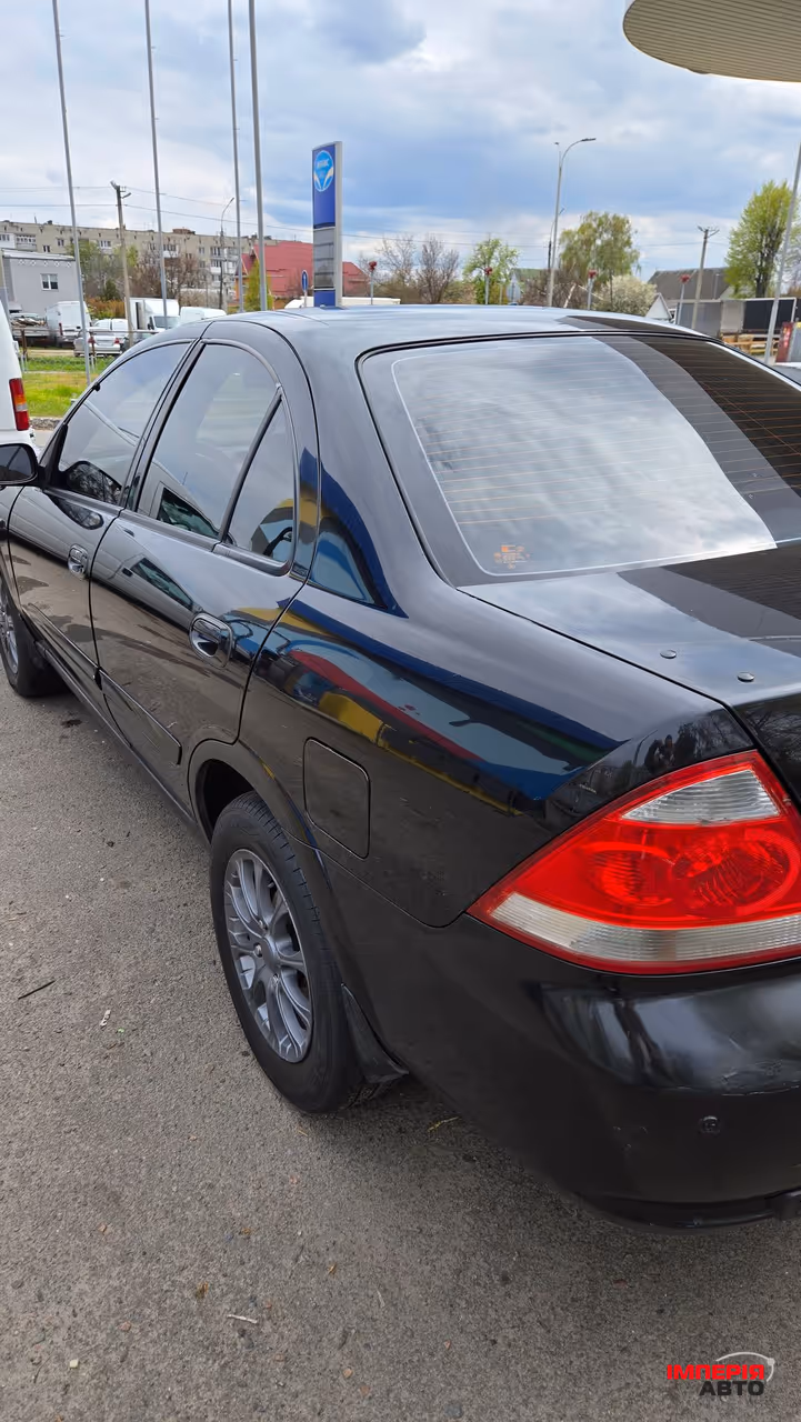 Nissan Almera Classic - фото 4