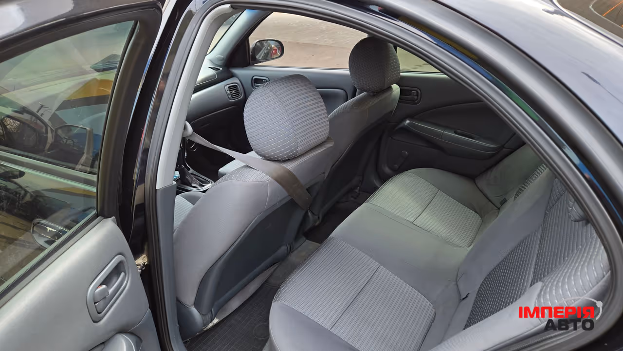 Nissan Almera Classic - фото 12