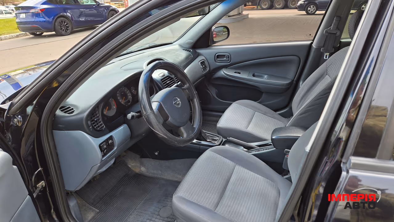 Nissan Almera Classic - фото 10