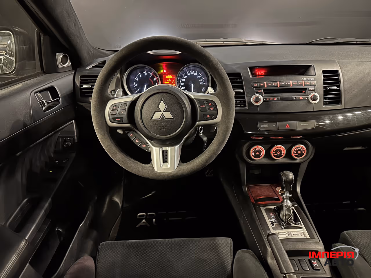 Mitsubishi Lancer - фото 9