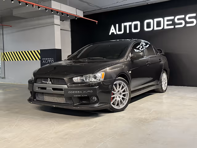 Mitsubishi Lancer - фото 1