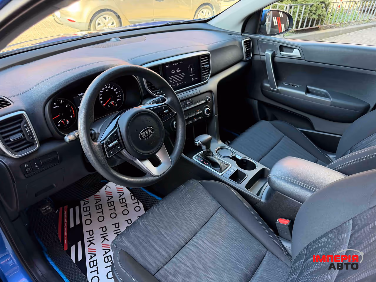 Kia Sportage - фото 14