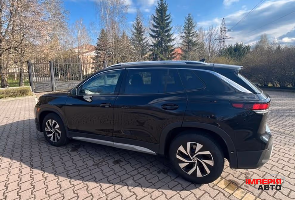 Volkswagen Tiguan - фото 4