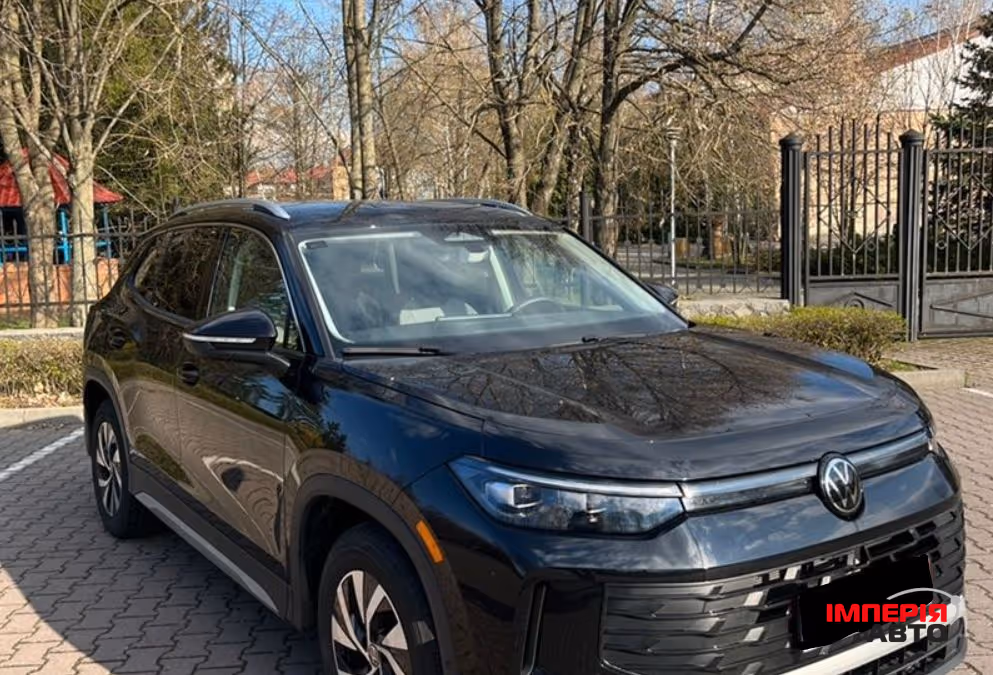 Volkswagen Tiguan - фото 1