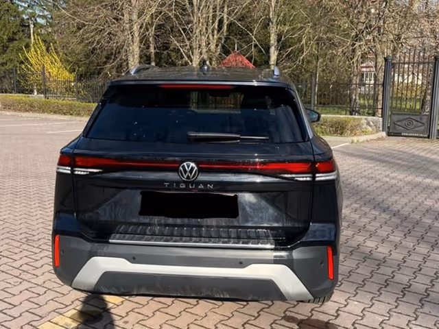 Volkswagen Tiguan - фото 5