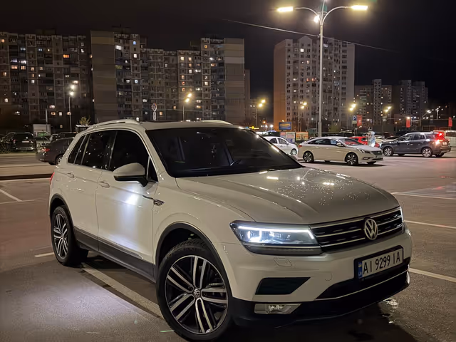Volkswagen Tiguan - фото 1