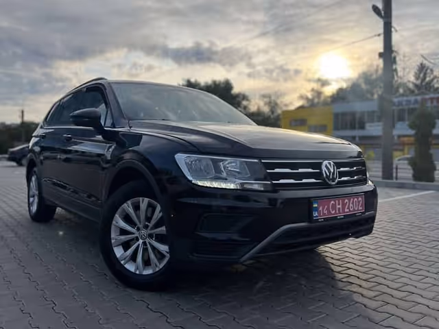 Volkswagen Tiguan - фото 1