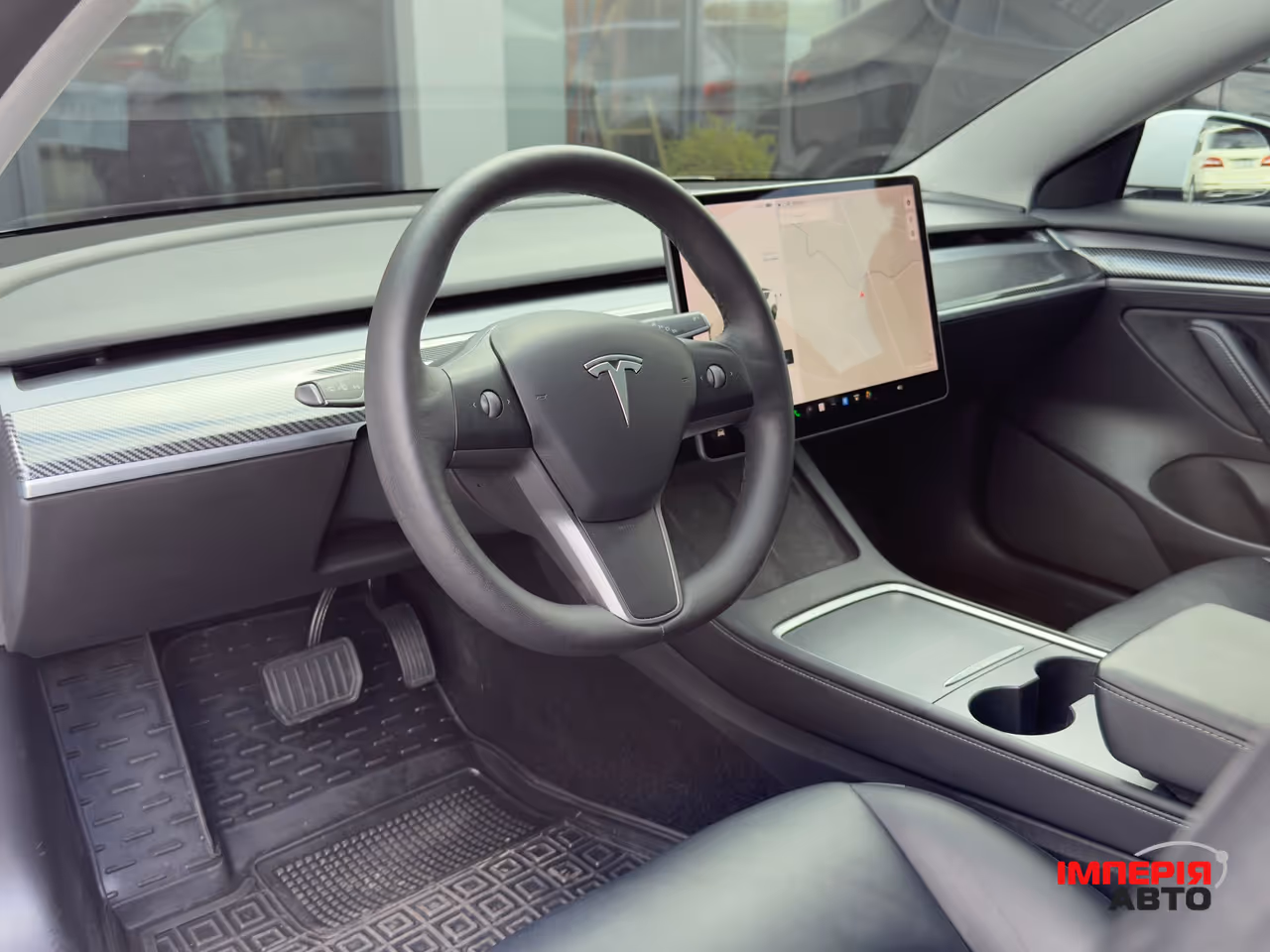 Tesla Model 3 - фото 11