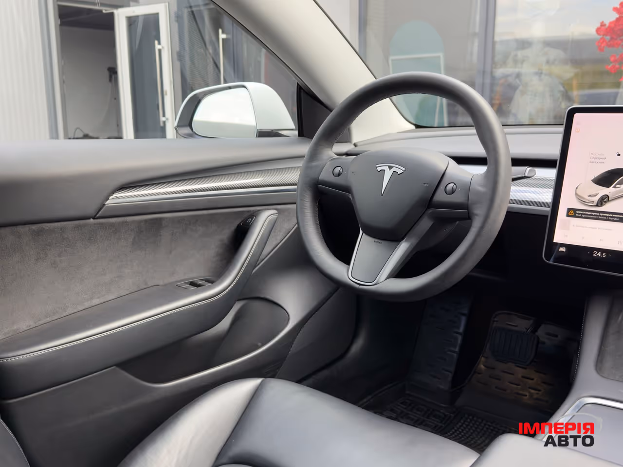 Tesla Model 3 - фото 13