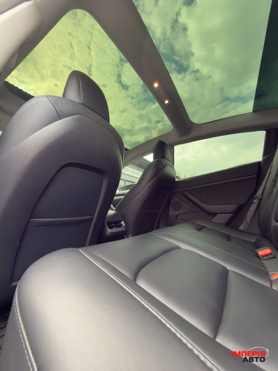 Tesla Model 3 - фото 18