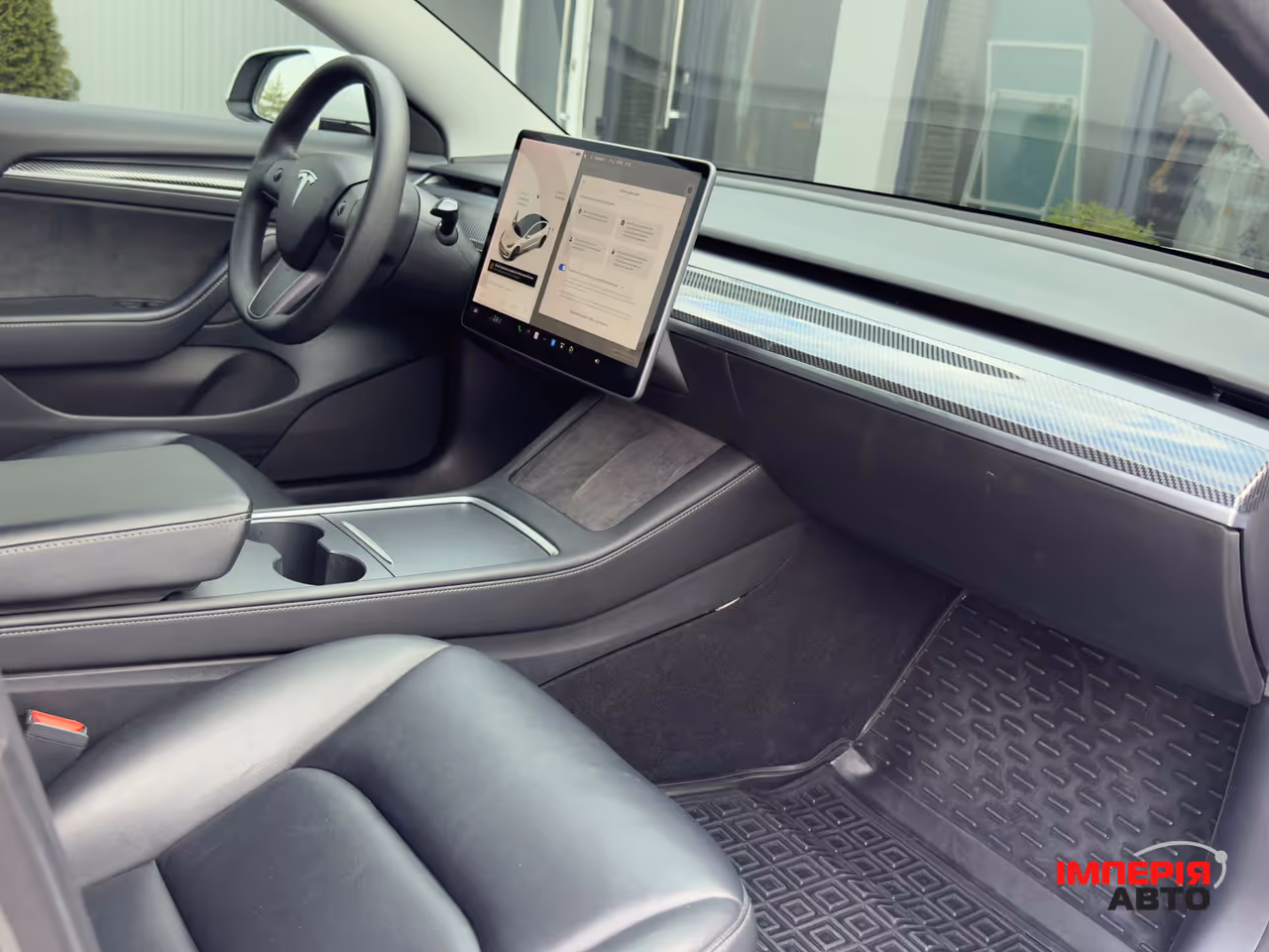 Tesla Model 3 - фото 12