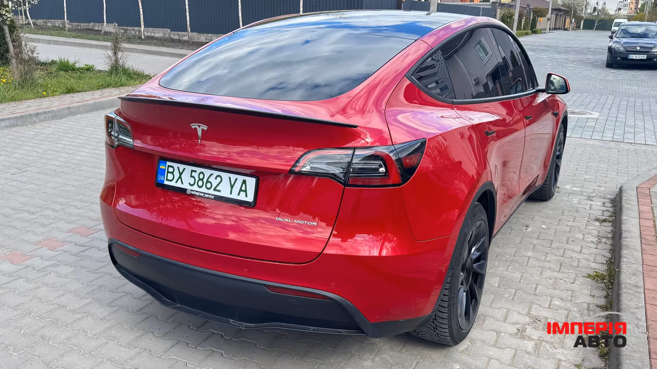 Tesla Model Y - фото 11